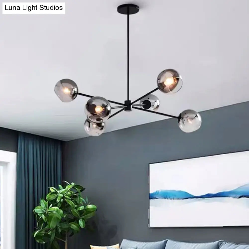 Minimalist Smoke Gray Glass Ball Chandelier With 6-Bulb Sputnik Pendant Lamp In Black Finish