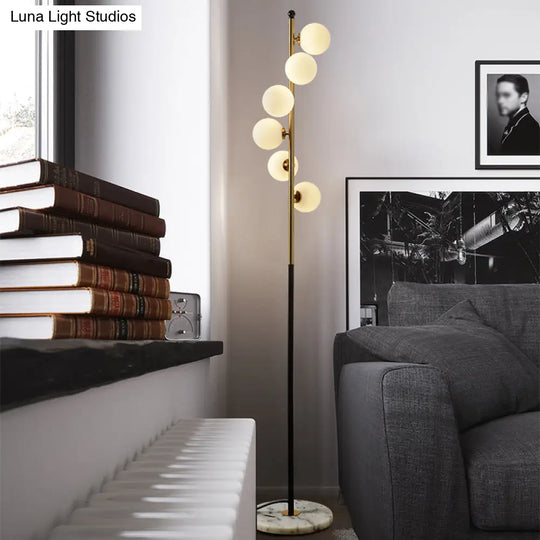 Minimalist Spiral Design - Gold And Black Ball Floor Lamp With 6-Bulb Cream Glass