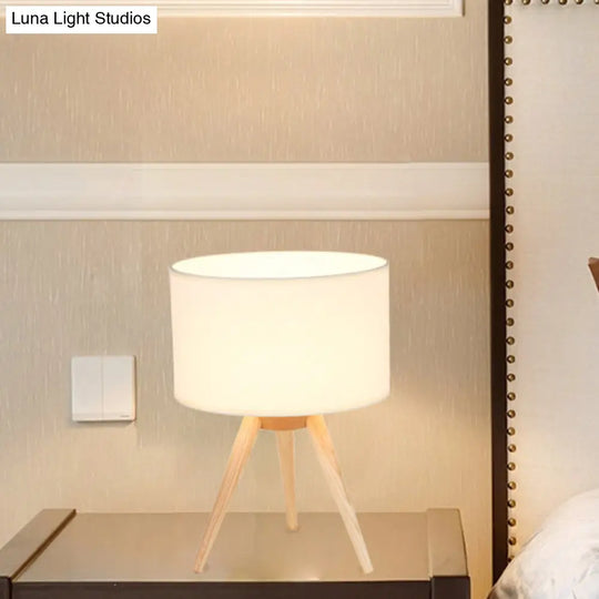 Minimalist Tripod Night Lamp With Drum Shade And Wood Base - Perfect For Single Bedrooms