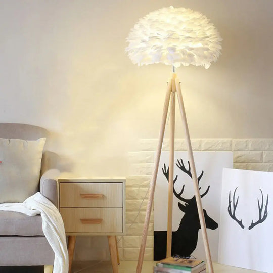 Minimalist White Dome Floor Lamp With Feather Detail And Wood Tripod Base