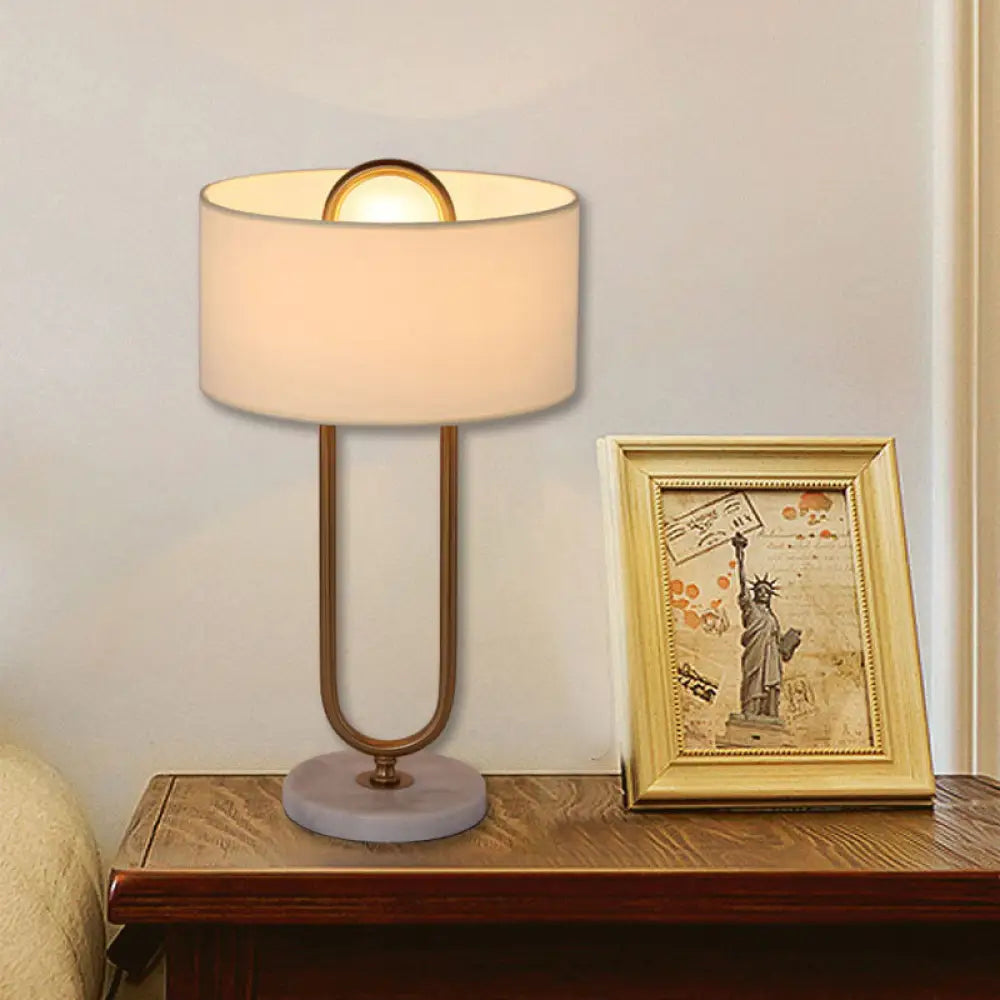 Minimalist White Drum Night Table Lamp With Brass Oval Stand - 1 Bulb Fabric Nightstand Light