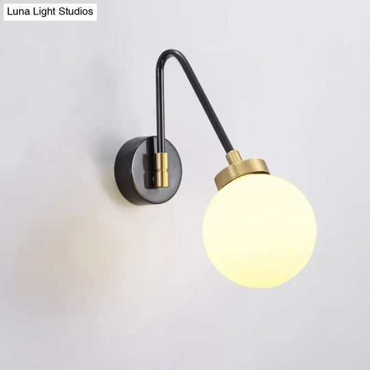 Minimalist White Glass Sconce Wall Light With Angled Black-Gold Arm