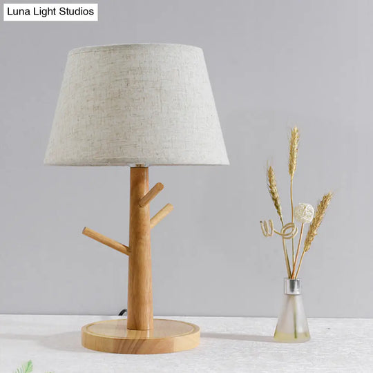 Minimalist Wood Tree Branch Nightstand Lamp With White Tapered Fabric Shade