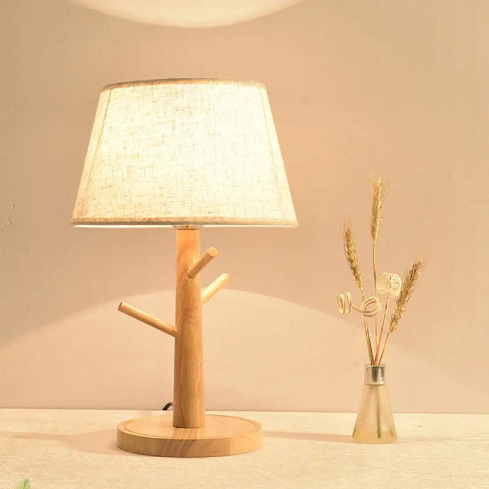 Minimalist Wood Tree Branch Nightstand Lamp With White Tapered Fabric Shade