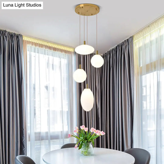 Minimalistic Gold/Black Pendant Lamp With 4 Lights And Cream Glass’ Or ’Minimalist 4-Light Glass