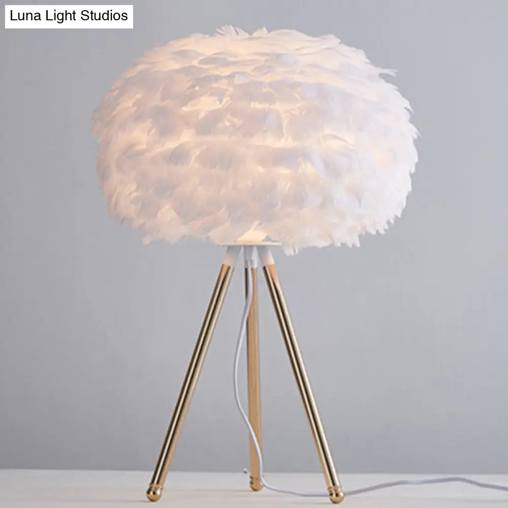 Minimalistic Metallic Tripod Table Light With Feather Shade In Gold