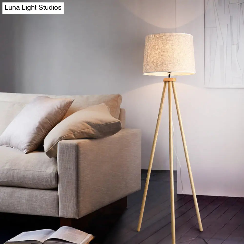 Minimalistic Tripod Floor Lamp With White Drum Shade - 1 Light Fabric