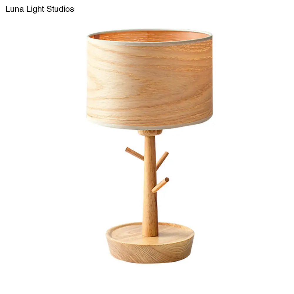 Modern 1-Light Beige Table Lamp With Wood Drum Shade And Hook Design - Functional Night Lighting