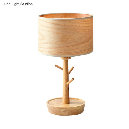 Modern 1-Light Beige Table Lamp With Wood Drum Shade And Hook Design - Functional Night Lighting