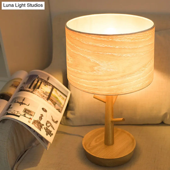 Modern 1-Light Beige Table Lamp With Wood Drum Shade And Hook Design - Functional Night Lighting