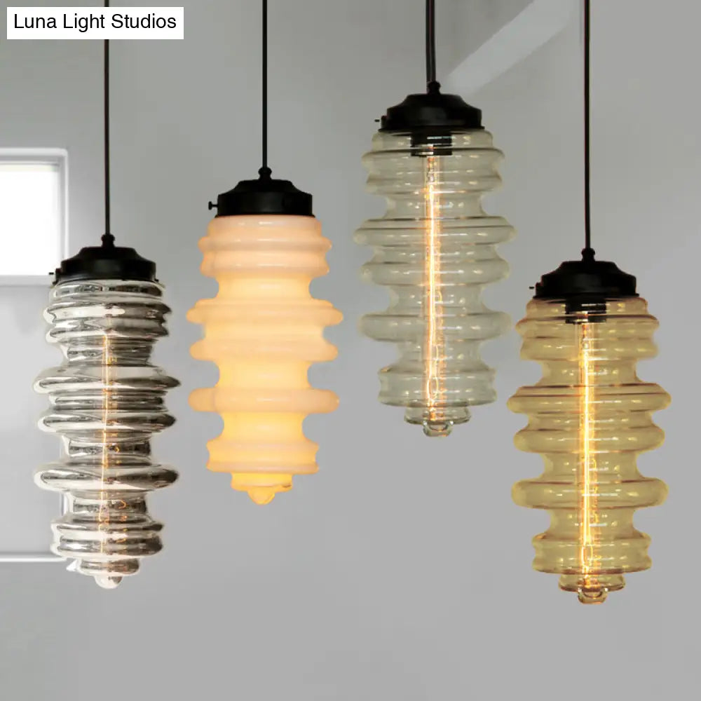 Modern 1-Light Pendant With Sleek Black Ribbed Ceiling Mount And Multi-Color Glass Shade