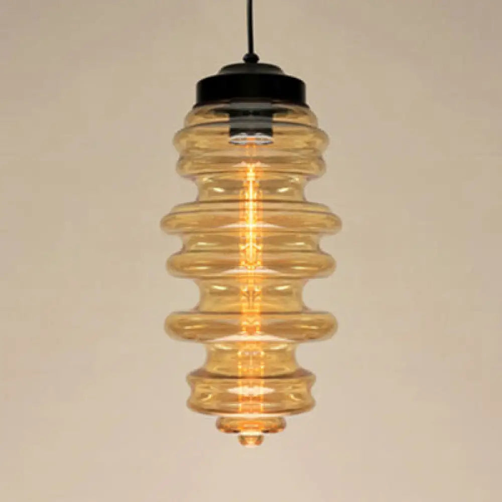 Modern 1-Light Pendant With Sleek Black Ribbed Ceiling Mount And Multi-Color Glass Shade Amber