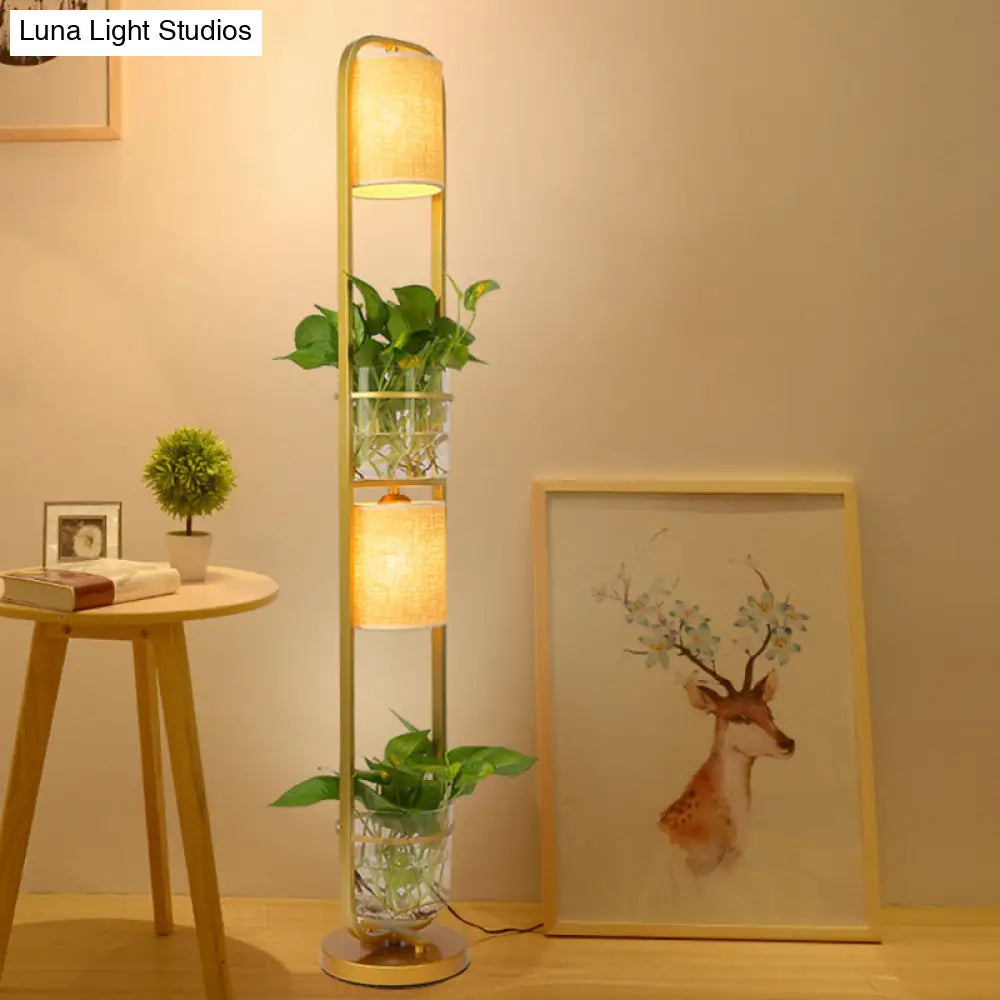 Modern 2-Headed Cylindrical Fabric Floor Lamp With Glass Plant Jar