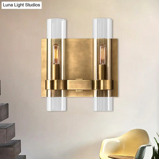 Modern 2-Headed Wall Sconce: Clear Glass Symmetrical Tube Black/Brass Finish