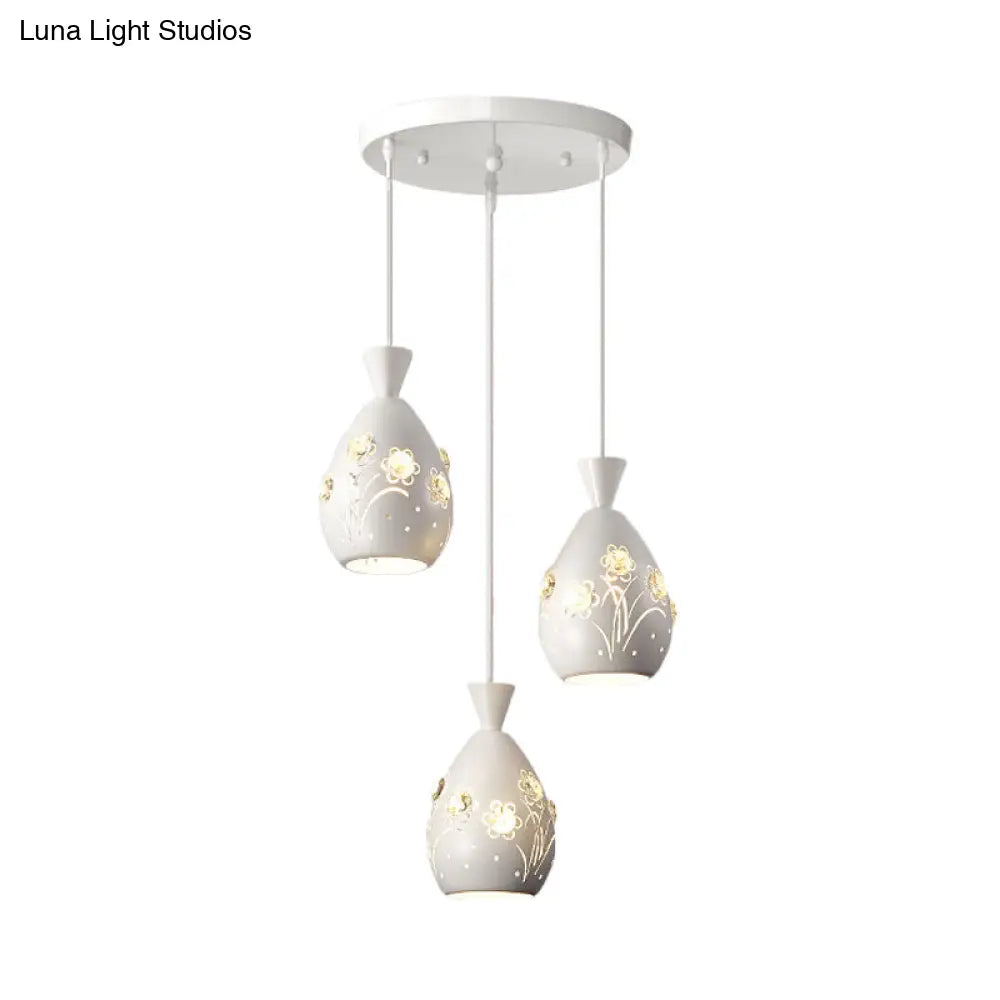 Modern White Wine Can-Shaped Pendant Light With Laser Cut Flower Design - Multi-Head Iron Hanging