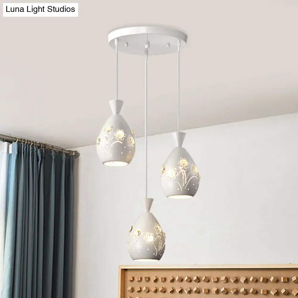 Modern White Wine Can-Shaped Pendant Light With Laser Cut Flower Design - Multi-Head Iron Hanging