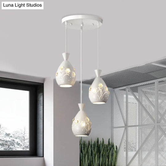 Modern White Wine Can-Shaped Pendant Light With Laser Cut Flower Design - Multi-Head Iron Hanging