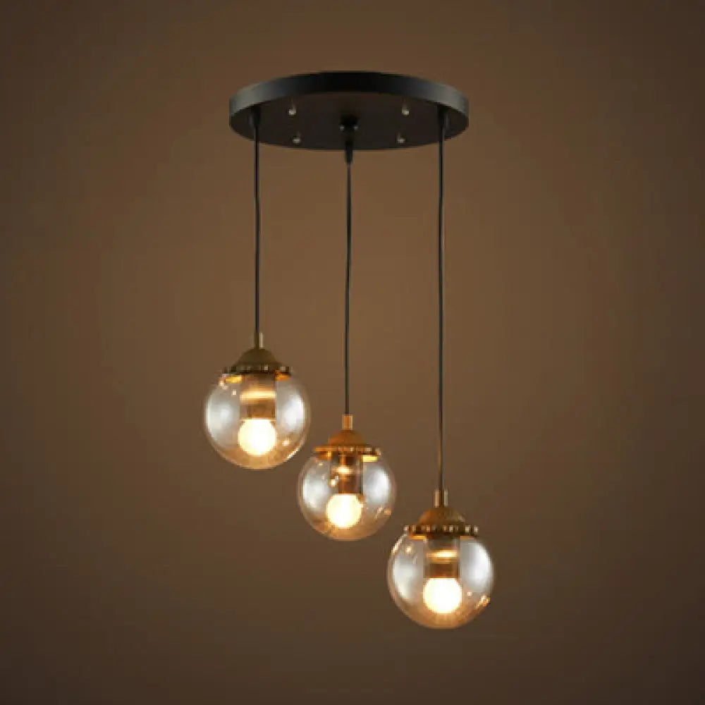 Modern 3-Light Clear Glass Pendant Lamp In Black For Coffee Shops - Orb Design With Linear/Round