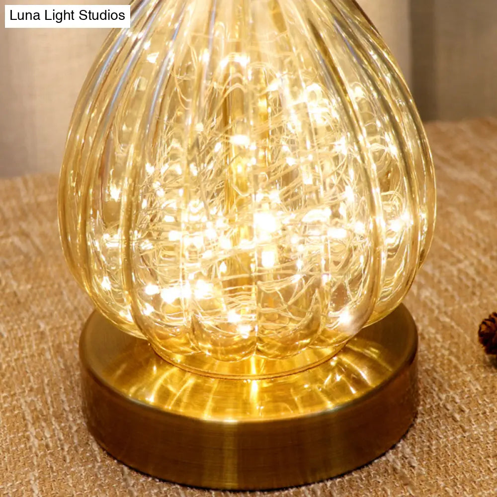 Modern Amber Glass Droplet Night Light With White Table Lamp And Feather Shade