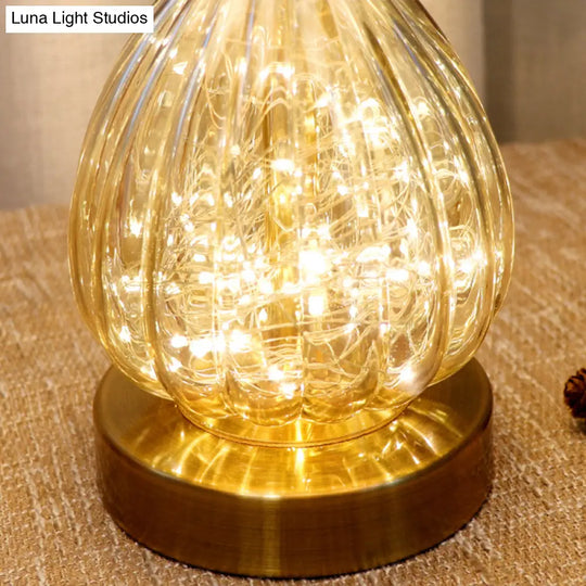 Modern Amber Glass Droplet Night Light With White Table Lamp And Feather Shade