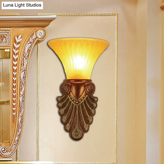 Modern Amber Glass Flared Shade Bedside Wall Sconce - 16/20.5 W Bronze Finish Peacock Tail Design