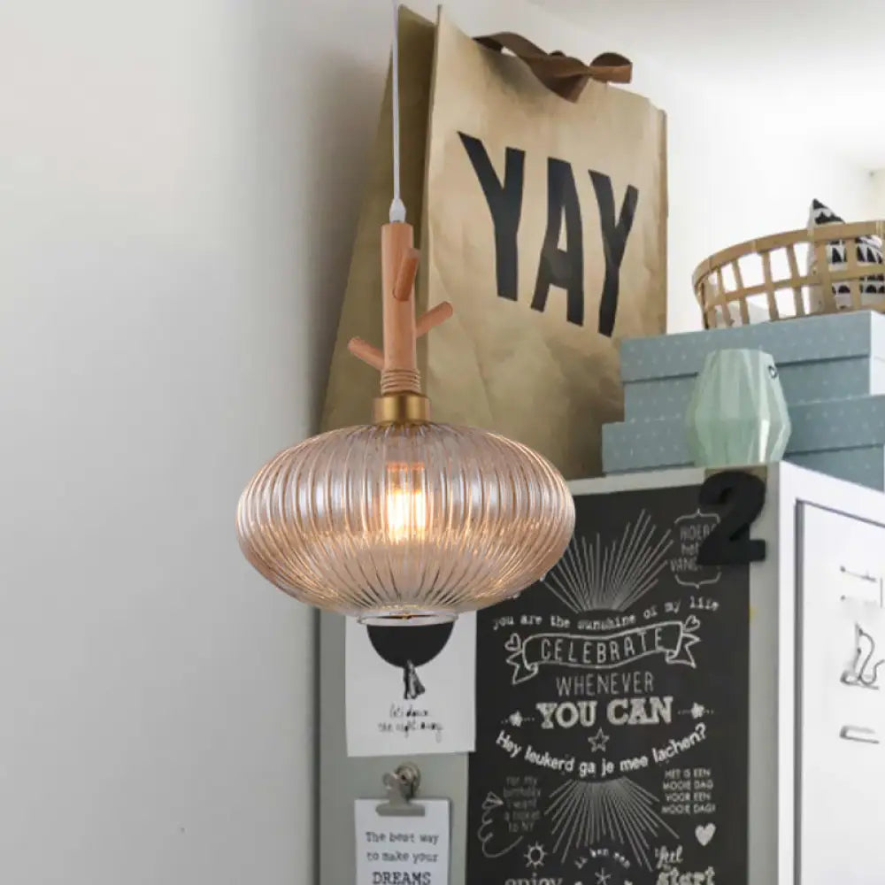 Modern Amber Glass Oval Pendant Lamp With Prismatic Design And Wooden Branch Cap