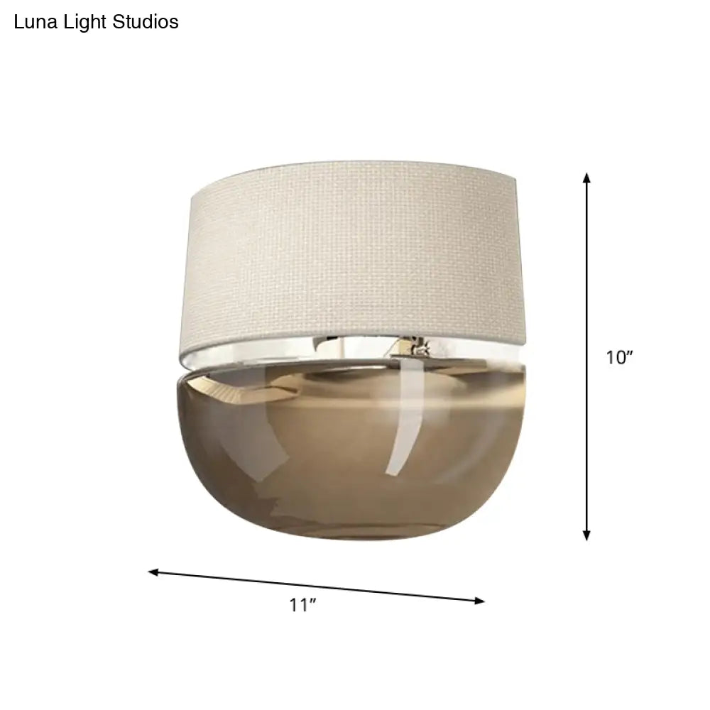 Modern Arched Wall Sconce In White With Grid Pattern Fabric And Tan Glass Bottom