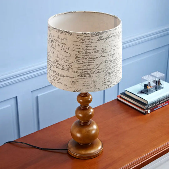 Modern Beige Cylinder Table Lamp With Gourd Base For Study Room