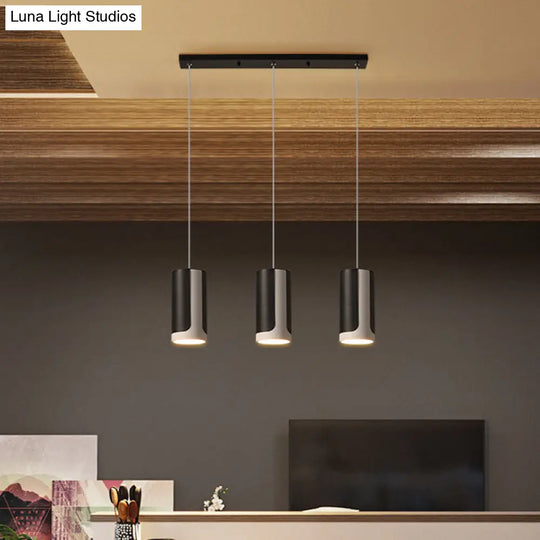 Modern Black Cylindrical Suspension Pendant Lamp - 3-Light Metallic Cluster