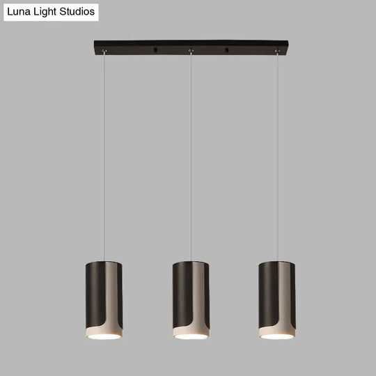 Modern Black Cylindrical Suspension Pendant Lamp - 3-Light Metallic Cluster