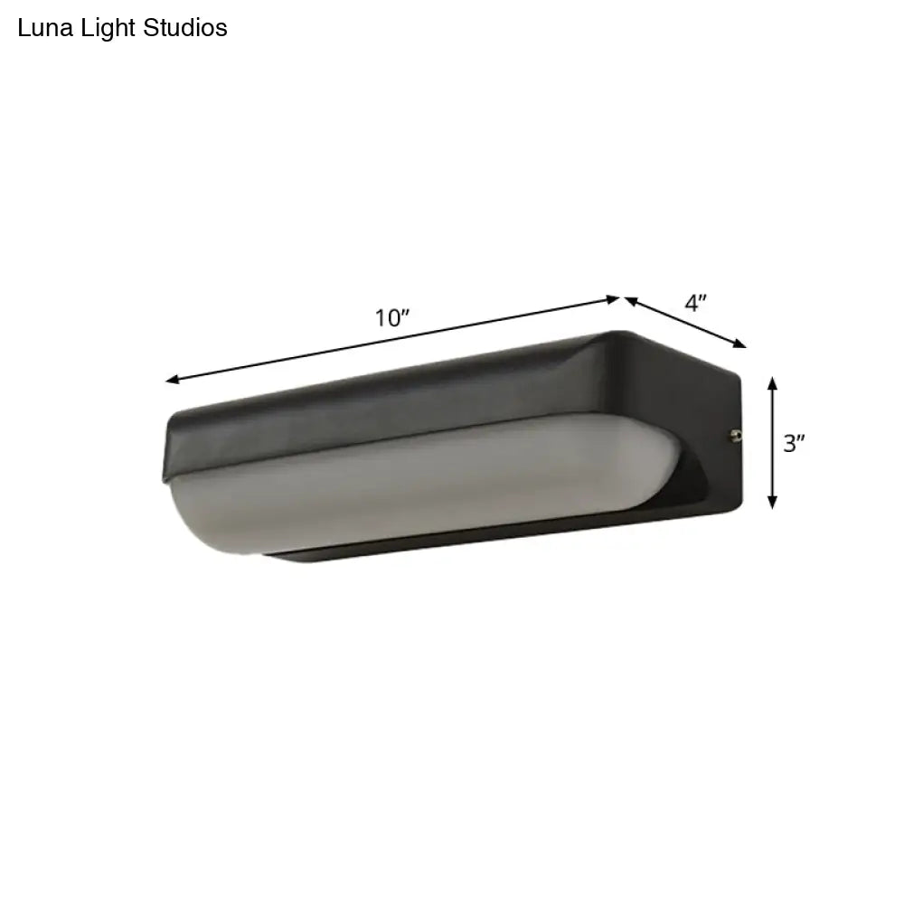 Modern Black Acrylic Wall Sconce With Flush Capsule Design And Half-Bulb Mounting