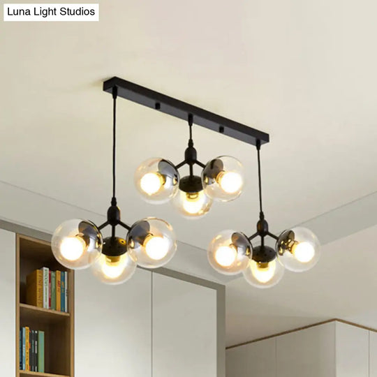 Modern Black Round Cluster Pendant Light With Linear Design And Clear Glass Shades