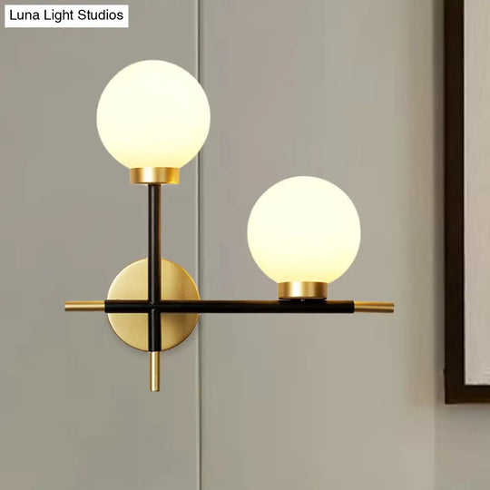 Modern Black Double Globe Wall Lamp With Cross Design - 2-Bulb Milky Glass Sconce Light Fixture For