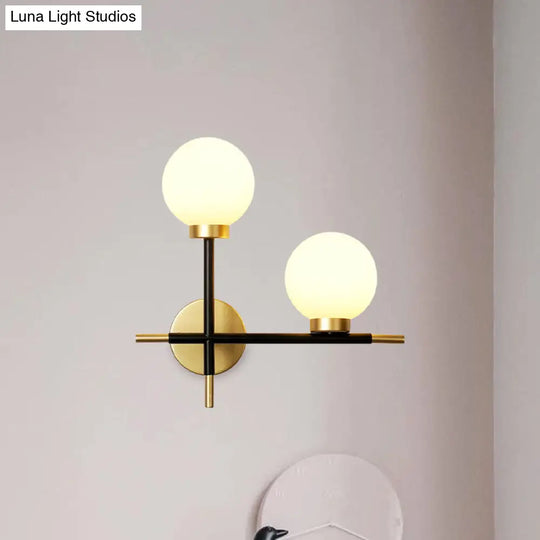 Modern Black Double Globe Wall Lamp With Cross Design - 2-Bulb Milky Glass Sconce Light Fixture For