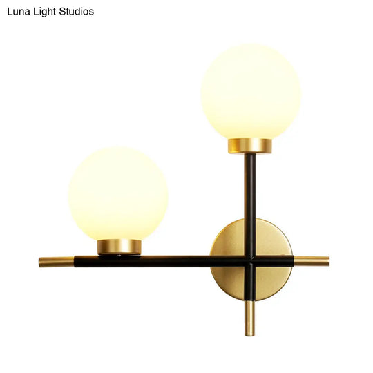 Modern Black Double Globe Wall Lamp With Cross Design - 2-Bulb Milky Glass Sconce Light Fixture For