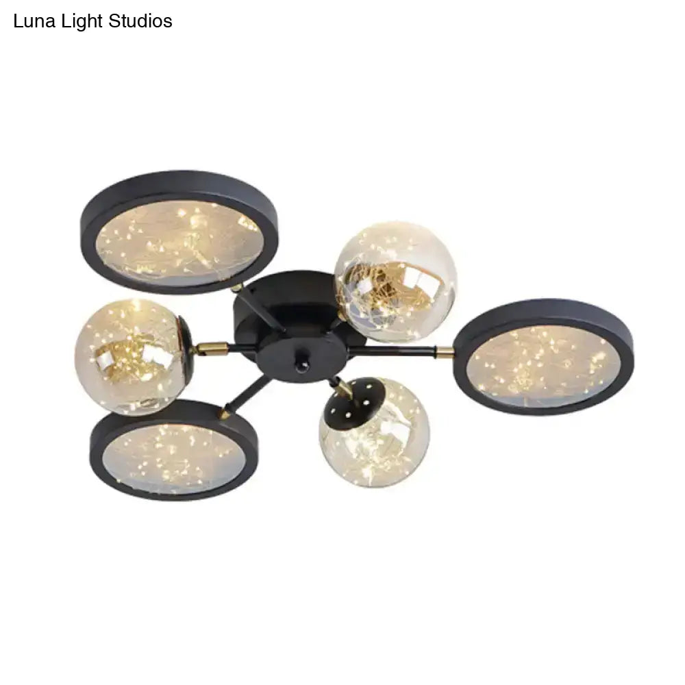 Modern Black Flush Mount With Amber Glass And Glowing String Inside