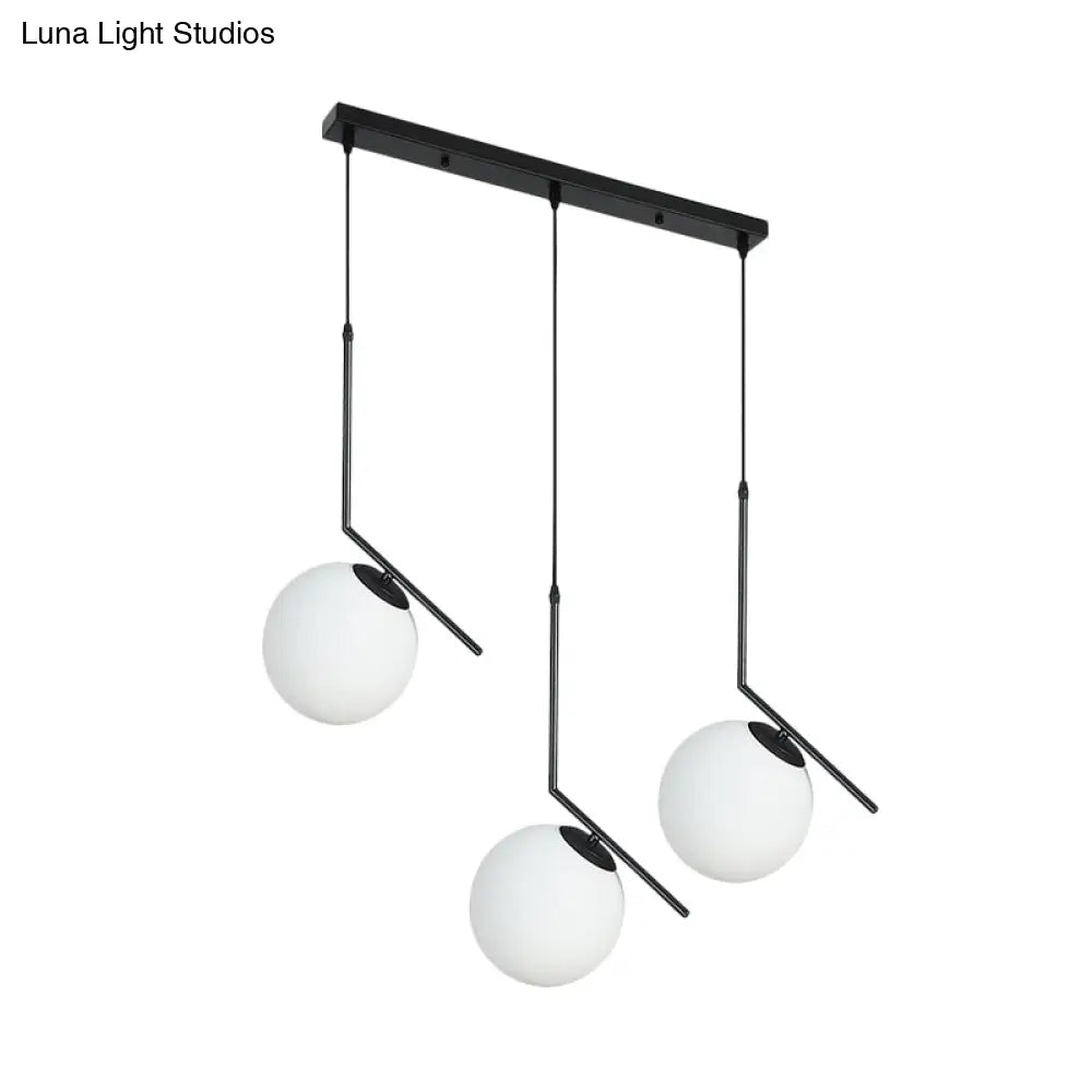 Modern Black Glass Orb Cluster Pendant Light With Angled Arm - 3-Light Ceiling Lamp