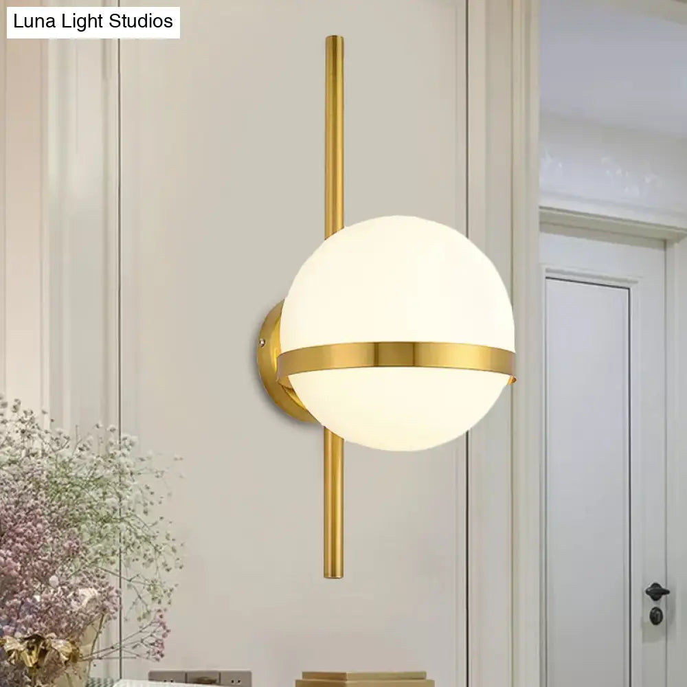 Modern Black/Gold Vertical Wall Sconce With Orbit Opal Glass Shade - 1 Head Metal Lamp 6/8 Width