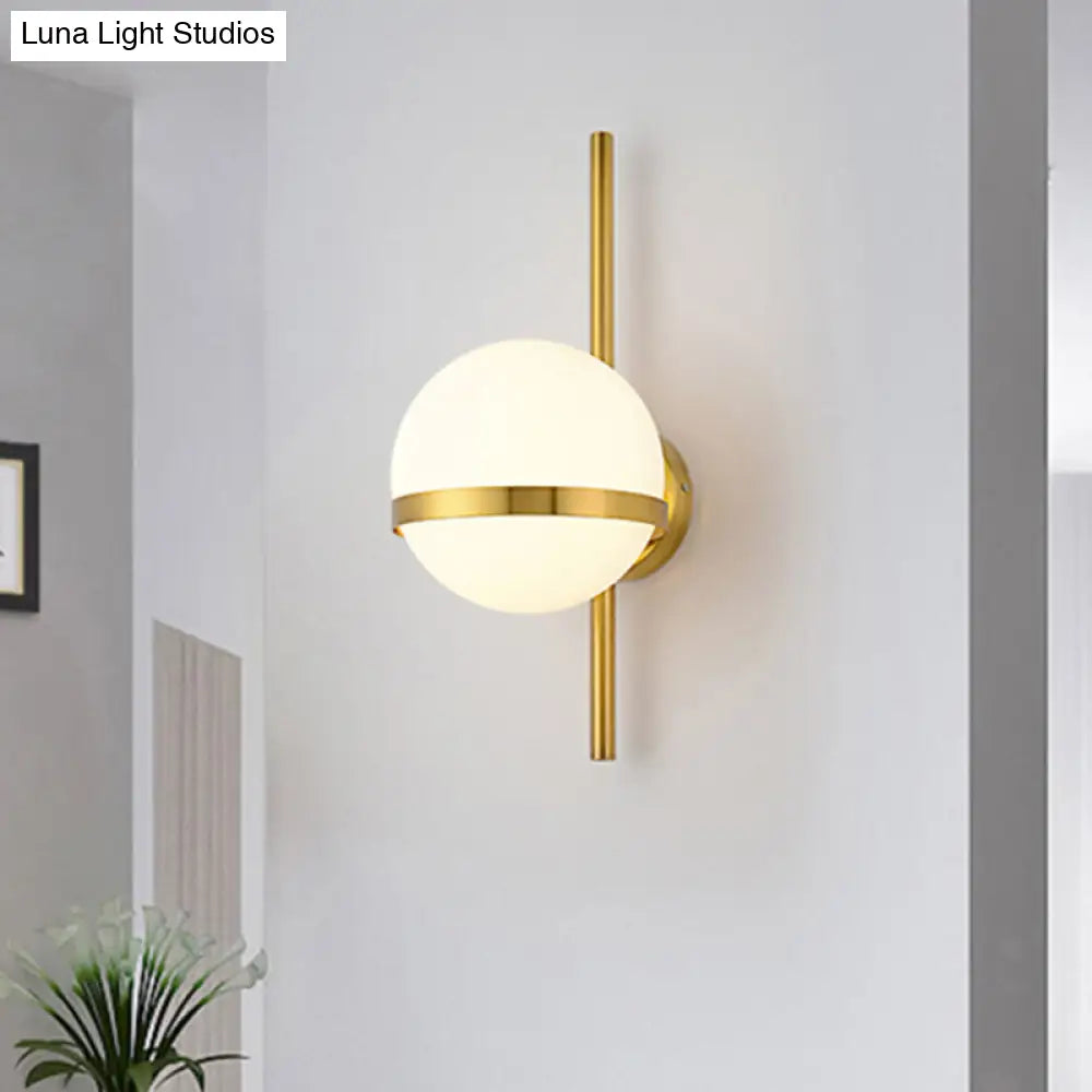 Modern Black/Gold Vertical Wall Sconce With Orbit Opal Glass Shade - 1 Head Metal Lamp 6/8 Width