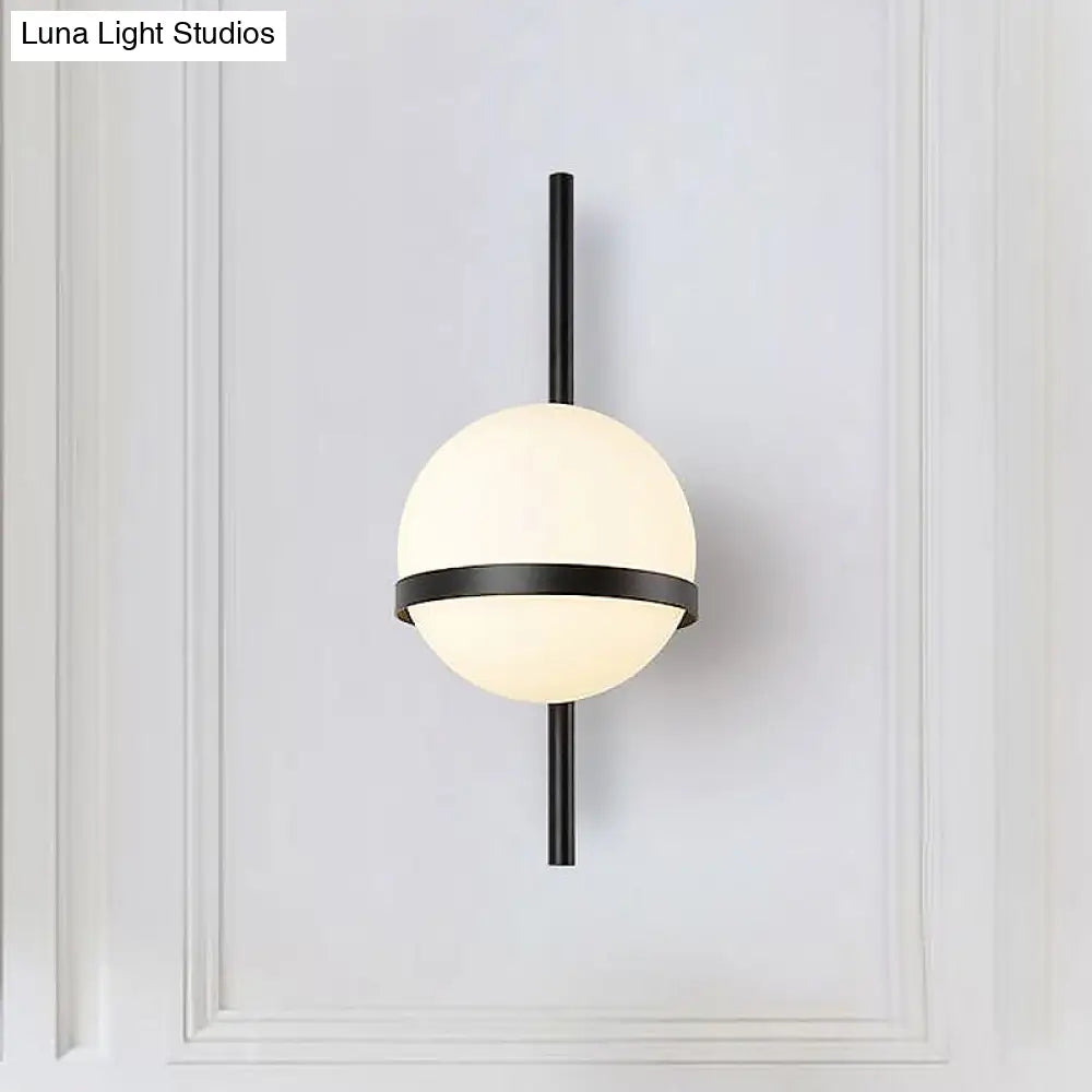 Modern Black/Gold Vertical Wall Sconce With Orbit Opal Glass Shade - 1 Head Metal Lamp 6/8 Width