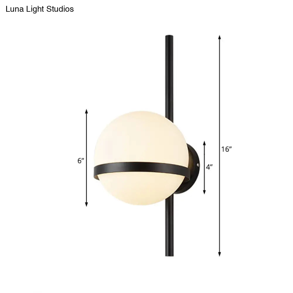 Modern Black/Gold Vertical Wall Sconce With Orbit Opal Glass Shade - 1 Head Metal Lamp 6/8 Width