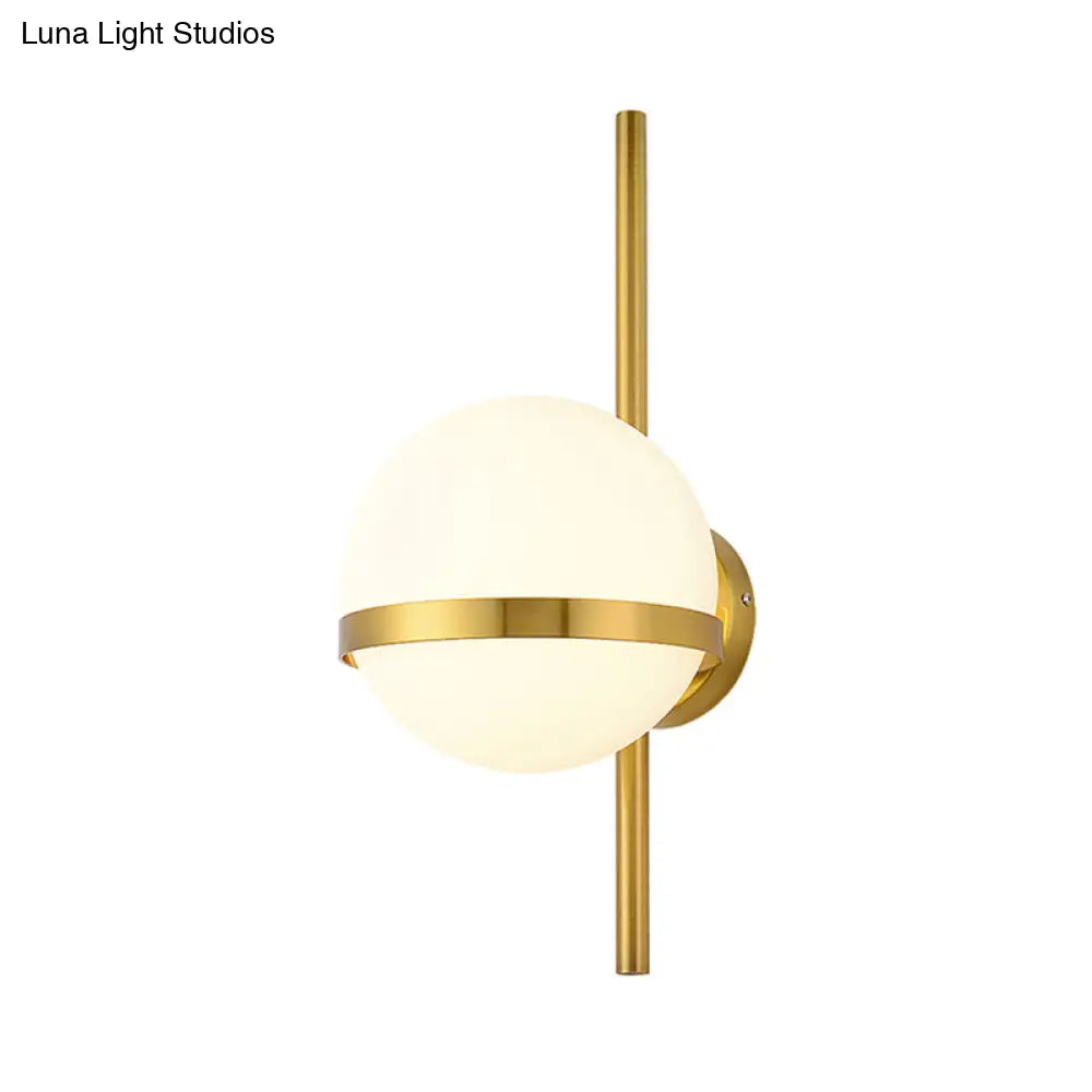 Modern Black/Gold Vertical Wall Sconce With Orbit Opal Glass Shade - 1 Head Metal Lamp 6/8 Width