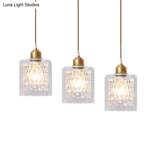 Modern Brass Cylinder Pendant Light With Prismatic Glass Shade - 3 Lights Linear/Round Canopy