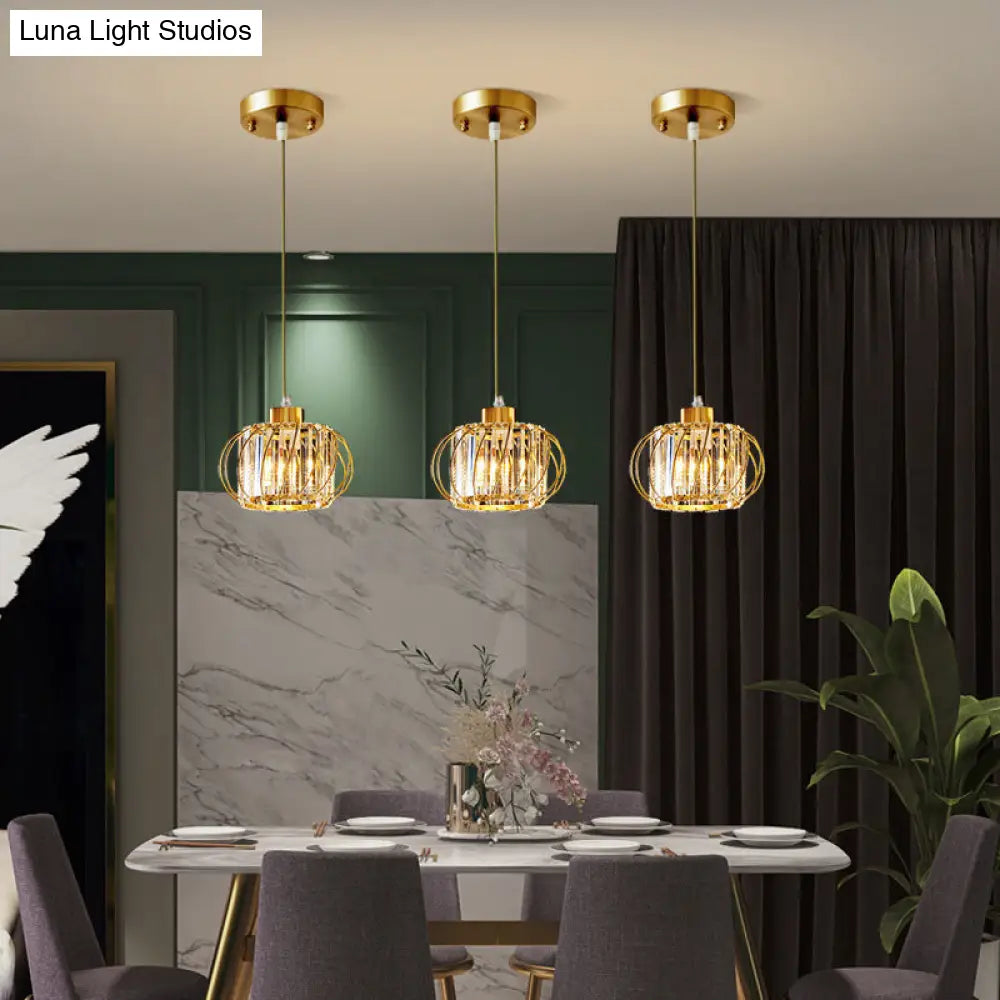 Modern Brass Globe Pendant Light With Crystal Accents Stylish Ceiling Lantern For Dining Area