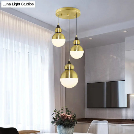 Modern Brass Gourd Dinette Pendant Light With Cream Matte Glass - 3 Bulbs Multi-Light Hanging Design