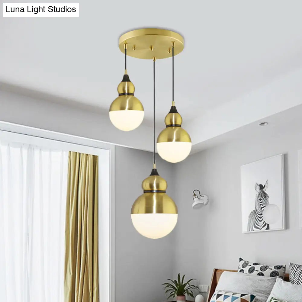 Modern Brass Gourd Dinette Pendant Light With Cream Matte Glass - 3 Bulbs Multi-Light Hanging Design