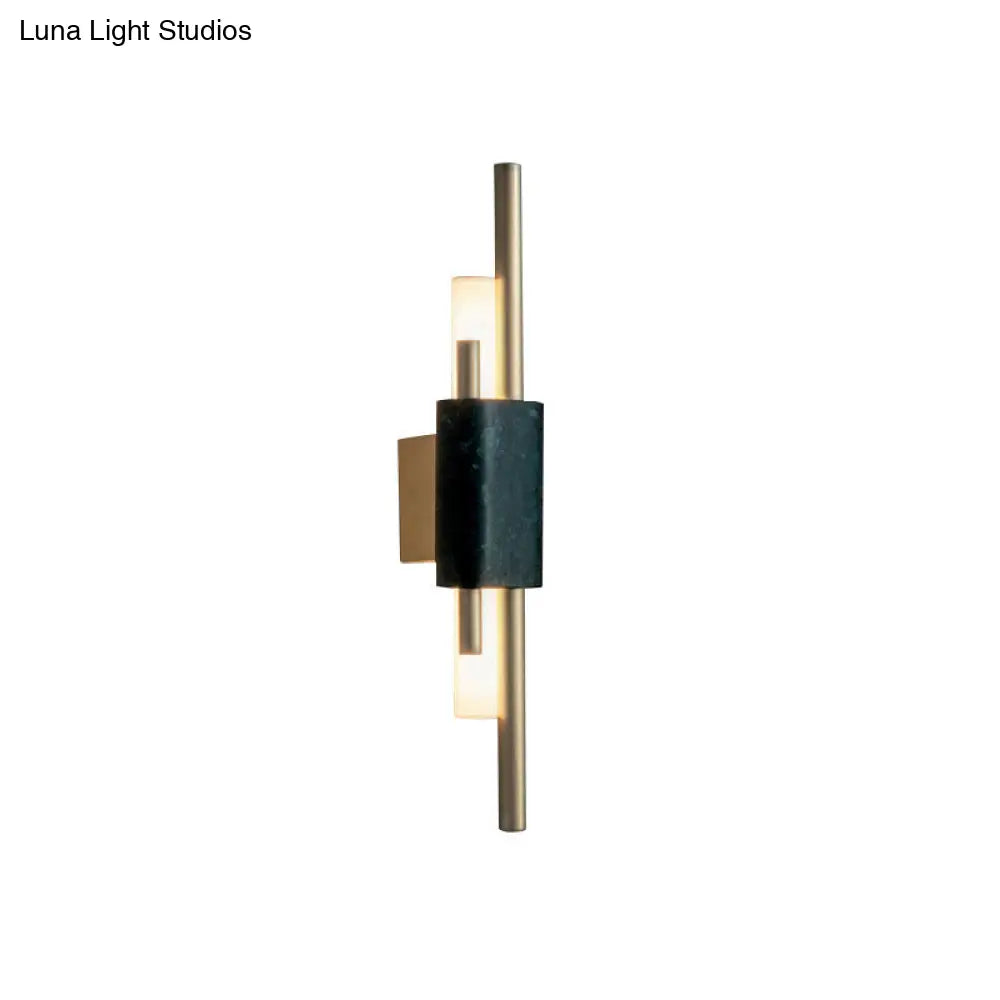 Modern Brass Led Wall Sconce With Slim Tube Design And Black Marble Deco