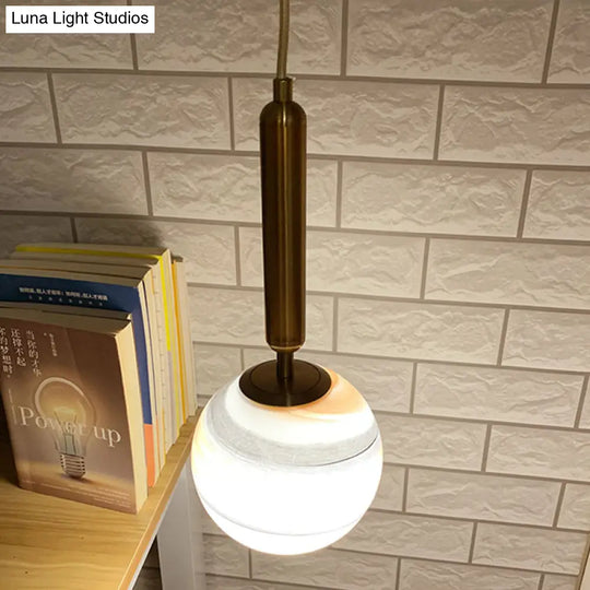 Modern Brass Pendant Bedroom Lamp With Tan/Blue Glass Shade