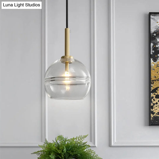 Modernist Brass Pendant Lamp With Clear/Smoke Gray Ruffle Glass Shade - 1 Light Living Room Hanging