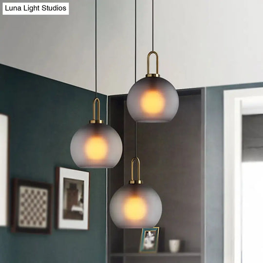 Modern Brass Living Room Pendant Lamp - Globe Clear/Smoky Glass Shade 1 Light 8/10/12 Wide